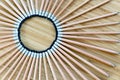 A top view image of several sharpened pencil on a wooden table