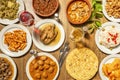 Top view image of spanish dishes and tapas, tortilla, salad, roast chicken, bordeaux meatloaf, green beans, torreznos, snails Royalty Free Stock Photo