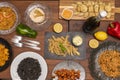 top view image of Spanish food tapas and dishes of black paella and Valenciana paella, with squid, fried eggplant, Royalty Free Stock Photo