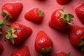 Top view image of strawberries with water droplets on pink Royalty Free Stock Photo