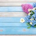 Top view image of sunflowers over blue wooden background. flowers over vintage painted blue wooden table. Backdrop with copy space Royalty Free Stock Photo