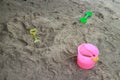 Top view image water bucket spade digging soil toys for children Playing at the sandy beach, by the background image Royalty Free Stock Photo