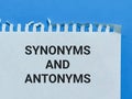 Top view image white paper written text synonyms and antonyms.