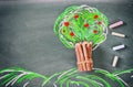 Top view image of wooden pencils and tree drawing