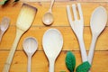 Top view image of Wooden spoons on the wooden desk, Different wooden kitchen tools on the table Royalty Free Stock Photo