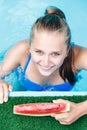 Top view image of young beautiful girl in pool