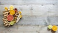 Top view on the immune system booster frame - ginger, turmeric, citruses, and honey Royalty Free Stock Photo