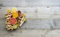 Top view on the immune system booster - ginger, turmeric, citruses, and honey on the old wooden board Royalty Free Stock Photo