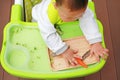 Top view of infant baby eating by Baby Led Weaning BLW. Finger foods concept Royalty Free Stock Photo