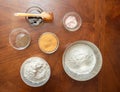 Top view of Ingredients for making homemade bread. Caraway seeds, flour, sugar, salt in glass bowls. home kitchen