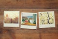 Top view of instant photos album on wooden background Royalty Free Stock Photo