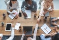 Top view of international creative team having business meeting Royalty Free Stock Photo