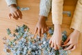 Interracial childrens hands solving puzzles