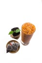 Top view, Isolate Iced Thai Tea glass cup with dried and fresh t Royalty Free Stock Photo