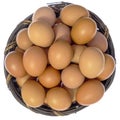 Top view of isolated eggs in basket. Royalty Free Stock Photo