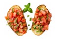 top view of Italian bruschetta with toasted bread topped with diced tomatoes, garlic, basil, and olive oil.