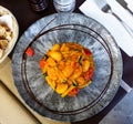 Top view of Italian gnocchi with zucchini and salmon