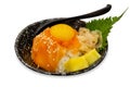 Top view of Japanese rice bowl with sliced salmon sashimi Soft-boiled eggs, Shrimp Roe with Seafood Sauce, focus selective Royalty Free Stock Photo