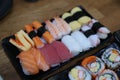 Top view Japanese set meal, sushi, rice balls, face of fresh fish that are delicious to eat on the table in the restaurant. Royalty Free Stock Photo