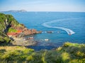 Top view at Jeju seongsan llchulbong and tourism activities for jet boat for sightseeing on sea