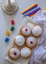 Jewish holiday Hanukkah symbols against white background