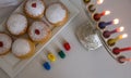 Jewish holiday Hanukkah symbols against white background