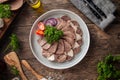 Kazakh national horse meat sausage qazy platter Royalty Free Stock Photo