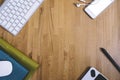 Top view of a keyboard, mouse, graphics tablet, color notebook, headphones and smartphone with empty blank screen on a background Royalty Free Stock Photo