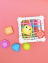 top view of kids educational toy, colorful cube with details for skills developing and brain boost. montessory method Royalty Free Stock Photo