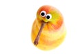 Top view of kiwi-bird-like pear with google eyes