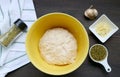 Top View of Kneaded Dough with Ingredients for Baking Focaccia Bread Royalty Free Stock Photo