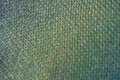 Top view of knitted fabric in shades of green