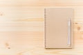 Top view of kraft spiral notebook isolated on background for mockup Royalty Free Stock Photo