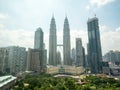 Top view of Kuala Lumper skyline with famous Petronas Twin Towers in Kuala Lumpur, Malaysia.