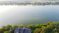 Top view Lake Granbury and Brazos River near historic downtown with waterfront residential and commercial properties