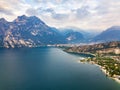 Top view of Lake Lago di Garda and the village of Torbole, alpine scenery. Italy Royalty Free Stock Photo