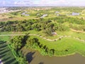 Top view lakeside urban green park with Yin Yang symbol in suburban Houston, Texas, USA