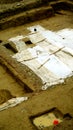 Top view of land with excavations and archaeological surveys with plastic sheets to protect the rain