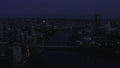 Top view of landscape of evening city with lanterns and river. Stock footage. Beautiful panorama of city with reflection Royalty Free Stock Photo