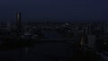 Top view of landscape of evening city with lanterns and river. Stock footage. Beautiful panorama of city with reflection Royalty Free Stock Photo