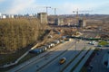 Top view of a large construction site with cranes and buildings houses concrete monolithic frame panel multi-storey skyscrapers of Royalty Free Stock Photo