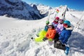 Top view of a large ski kids group sit in snow Royalty Free Stock Photo