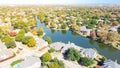 Top view large subdivision sprawl near Dallas, Texas, USA with lakeside houses and master planned community