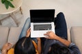 Top view of latin couple using laptop Royalty Free Stock Photo