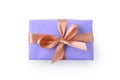 Top view of lavender gift box with orange ribbon bow isolated on white background Royalty Free Stock Photo