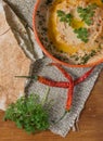 Lebanese hummus salad on rustic wooden table Royalty Free Stock Photo