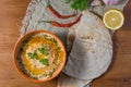 Lebanese hummus salad on rustic wooden table Royalty Free Stock Photo