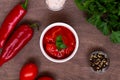 Lecho of tomatoes and sweet paprika with ingredients on the table Royalty Free Stock Photo