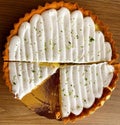 Top view lemon pie missing a slice Royalty Free Stock Photo