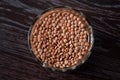 Top view on the lentils are soaked in a glass of water Royalty Free Stock Photo